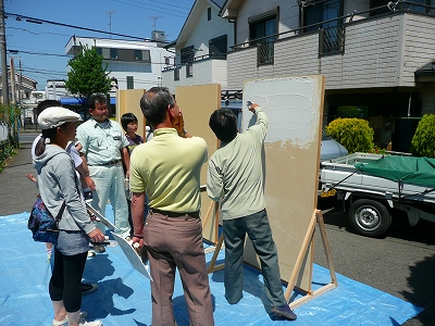 左官職人の指導